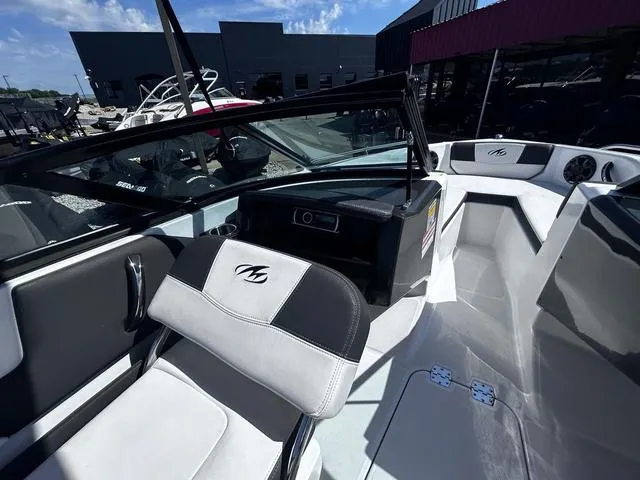 Slide: The Image of 2016 Monterey 196MS boat interior with sleek seating and modern dashboard. - 10