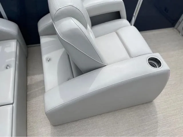 Slide: The Image of Luxurious gray seating with cup holder on 2018 SunCatcher X324RS boat. - 13