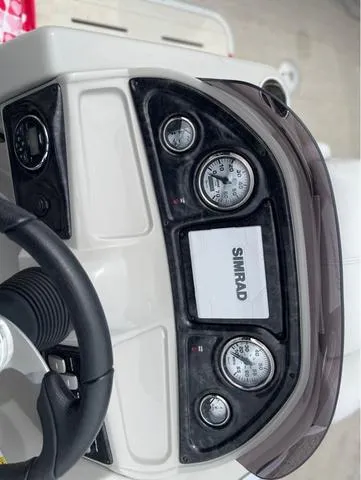 Slide: The Image of Dashboard of 2018 SunCatcher X324RS boat with Simrad display and gauges. - 17