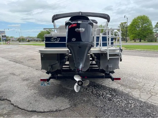 Slide: The Image of 2018 SunCatcher X324RS pontoon boat with 225 horsepower engine on a trailer. - 5