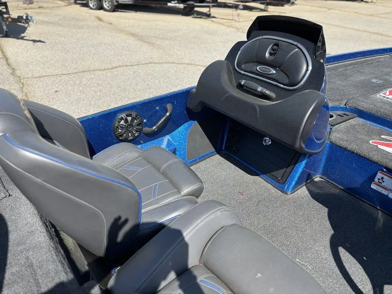 Slide: The Image of 2018 Nitro Z21 boat interior with gray seats and dashboard, featuring blue accents. - 11