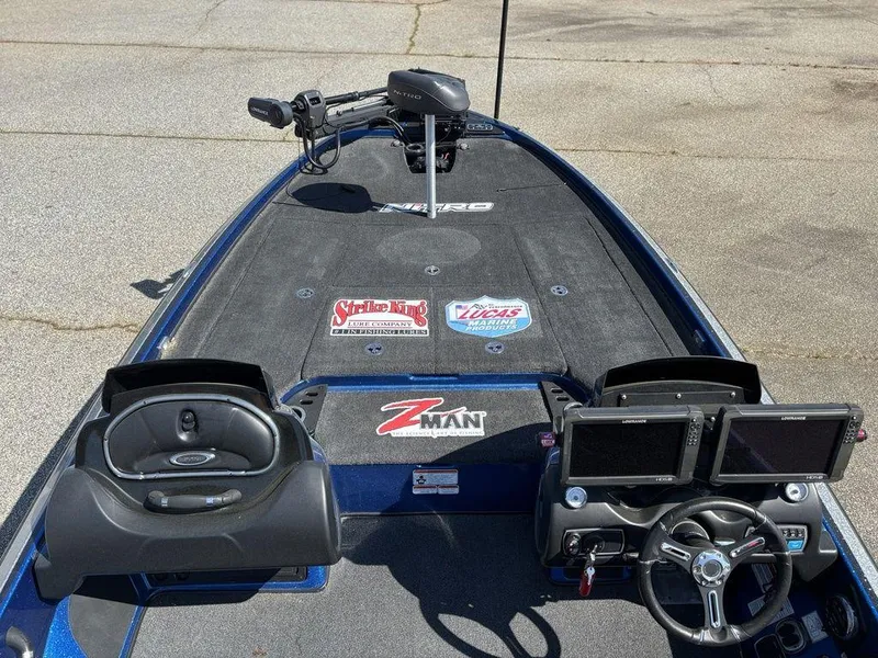Slide: The Image of 2018 Nitro Z21 boat deck with dual screens and branded decals. - 13