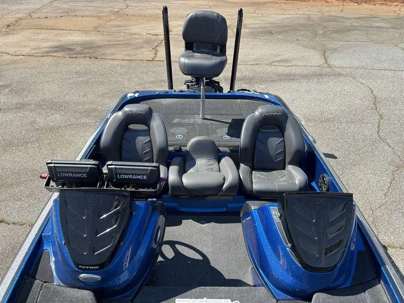 Slide: The Image of 2018 Nitro Z21 boat interior with dual Lowrance fish finders and seating. - 16