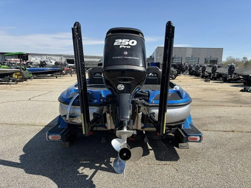 Slide: The Image of 2018 Nitro Z21 boat with 250 Pro motor, parked outdoors. - 4