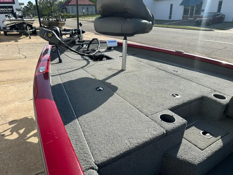 Slide: The Image of 2019 Tracker Pro Team 175 TXW Tournament Edition boat with red exterior and fishing seat. - 6