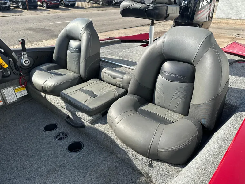 Slide: The Image of 2019 Tracker Pro Team 175 TXW Tournament Edition boat seats, gray leather, outdoor setting. - 7