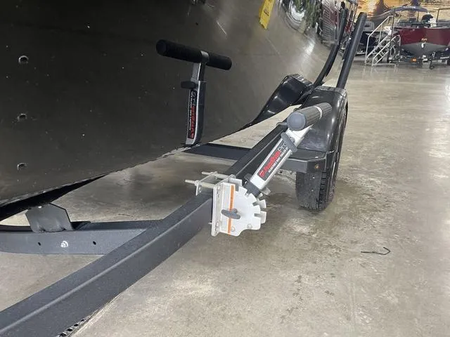 Slide: The Image of 2021 Lund 1650 Rebel XL SS boat on trailer in showroom. - 14