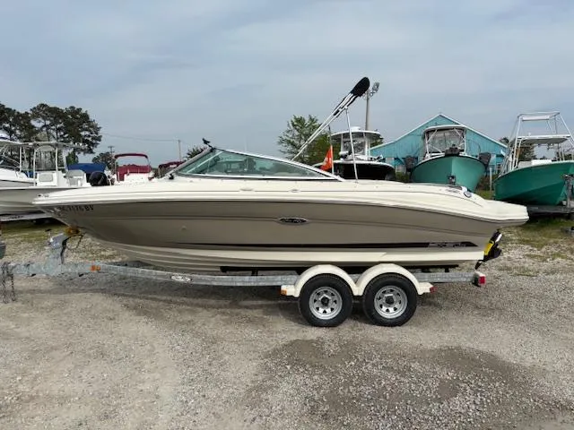 Slide: The Image of 2006 Sea Ray 200 Select boat on trailer, parked outdoors. - 10