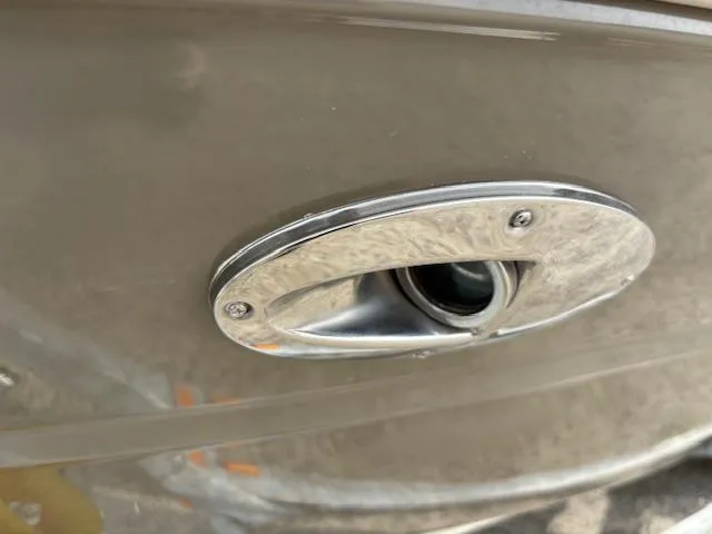 Slide: The Image of Close-up of a 2006 Sea Ray 200 Select boat exhaust outlet. - 41