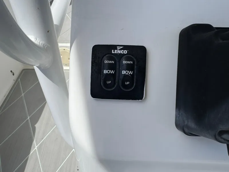 Slide: The Image of Lenco trim tab control panel on 2005 Regulator 23 Center Console boat. - 22