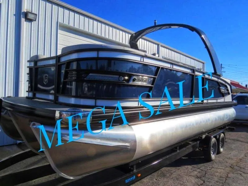 Slide: The Image of 2023 Godfrey AquaPatio 255 ULC pontoon boat on sale, displayed outdoors. - 1