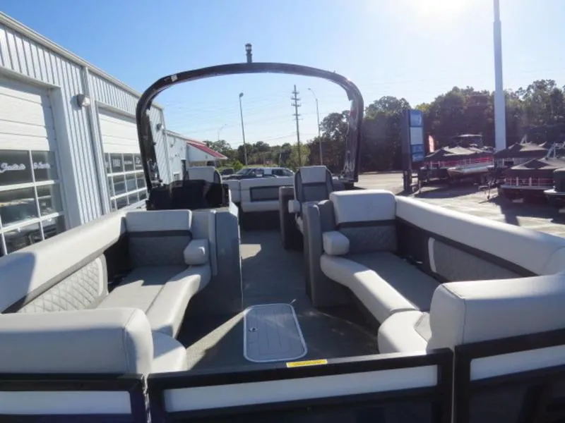 Slide: The Image of 2023 Godfrey AquaPatio 255 ULC pontoon boat with spacious seating and modern design. - 13