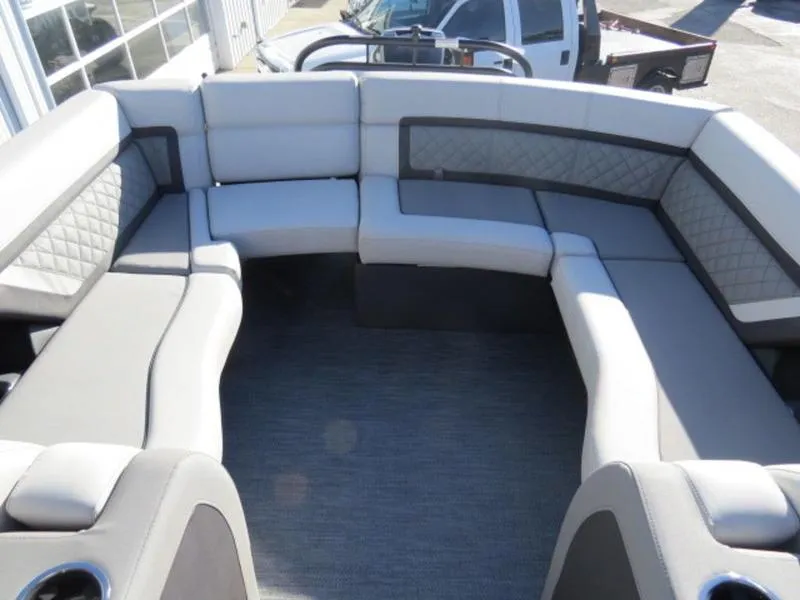 Slide: The Image of Luxurious seating on 2023 Godfrey AquaPatio 255 ULC pontoon boat, featuring elegant upholstery. - 9