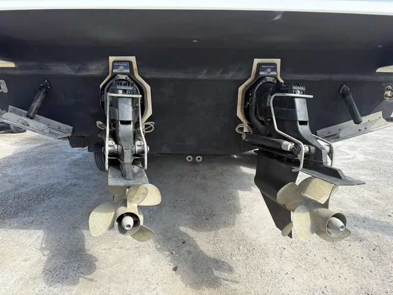 Slide: The Image of Twin propellers of a 2011 Formula 340PC boat on a dry dock. - 12