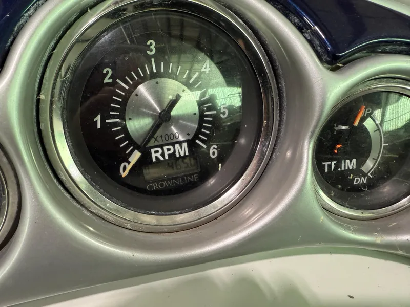 Slide: The Image of Close-up of 2007 Crownline 250 CR boat RPM and trim gauges. - 15