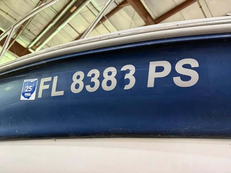 Slide: The Image of 2007 Crownline 250 CR boat with registration FL 8383 PS displayed. - 16