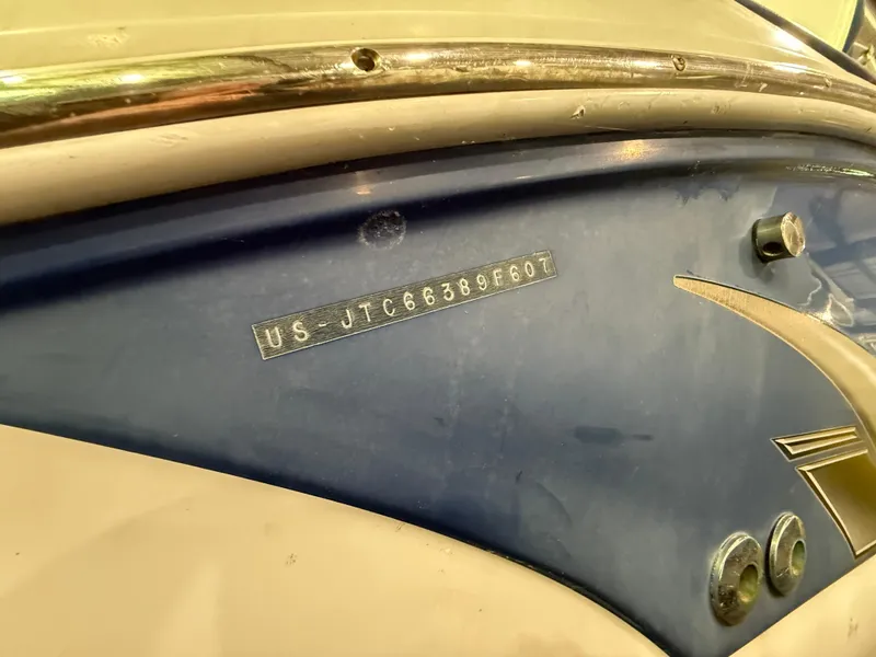 Slide: The Image of 2007 Crownline 250 CR boat hull identification number (HIN) on blue and white surface. - 4