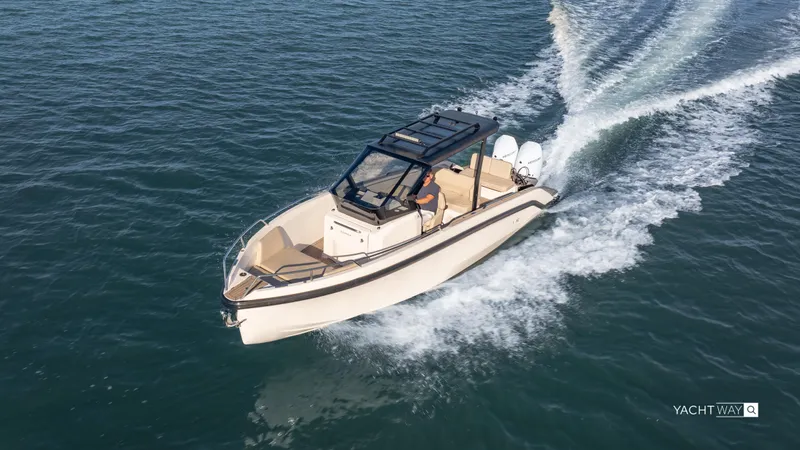 Slide: The Image of 2025 Rand Roamer boat cruising on open water, showcasing sleek design and powerful performance. - 13
