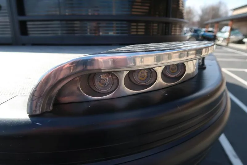 Slide: The Image of 2021 Bennington R Bowrider Quad Bench 24 RTFB, close-up of sleek LED lights. - 14