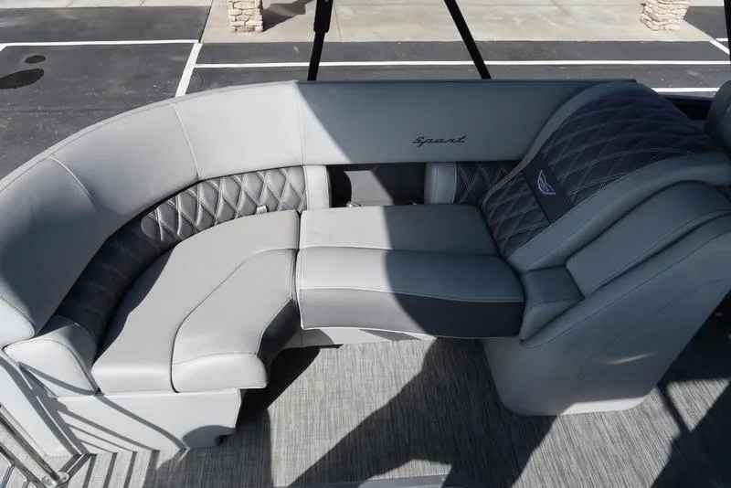 Slide: The Image of 2021 Bennington R Bowrider Quad Bench 24 RTFB, featuring luxurious gray seating. - 25