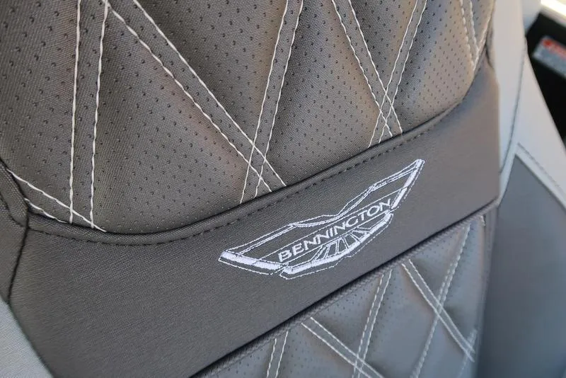 Slide: The Image of Close-up of 2021 Bennington R Bowrider Quad Bench 24 RTFB seat with logo embroidery. - 29