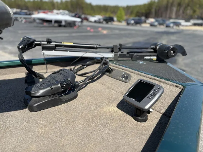 Slide: The Image of 2004 Tracker Pro Team 185 boat deck with trolling motor and fish finder. - 14