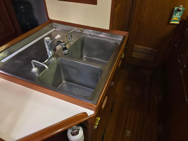 Slide: The Image of Double stainless steel sink in a 1982 Stevens 40" yacht kitchen. - 15