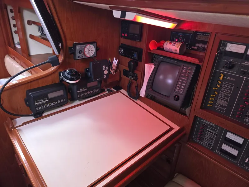 Slide: The Image of Navigation station on a 1982 Stevens 40" yacht with instruments and control panels. - 19