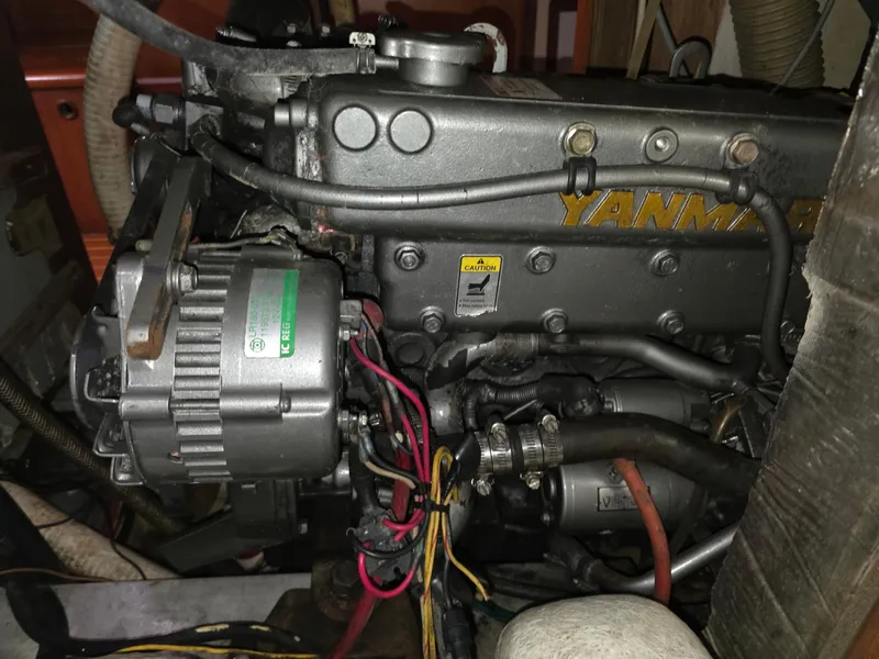 Slide: The Image of Yanmar engine in 1982 Stevens 40-inch model, detailed view with wiring and components. - 30