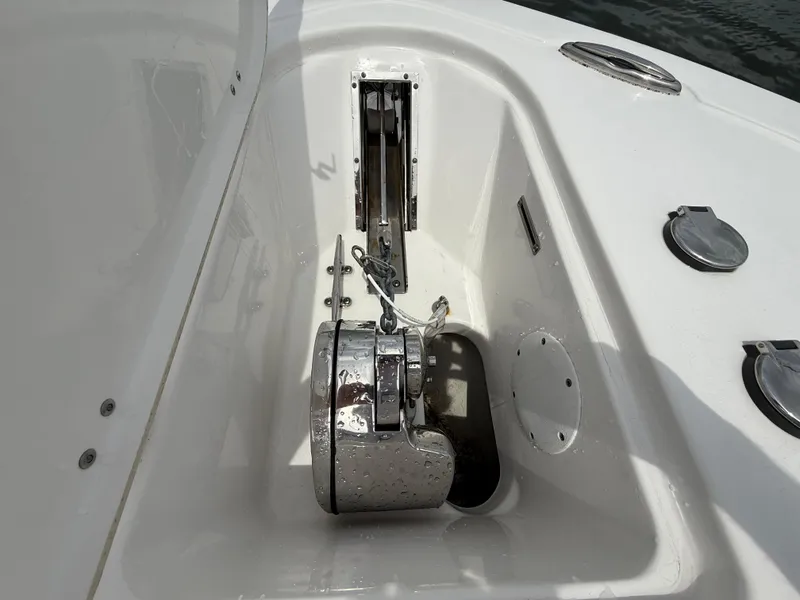 Slide: The Image of Anchor compartment of 2022 Tidewater 232 CC Adventure boat, featuring a sleek design. - 25
