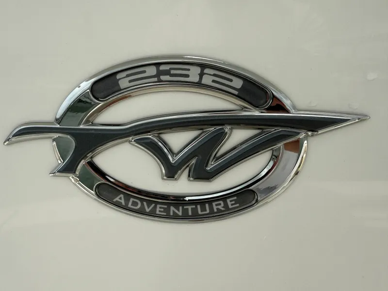 Slide: The Image of Tidewater 232 CC Adventure 2022 emblem on a white background. - 30