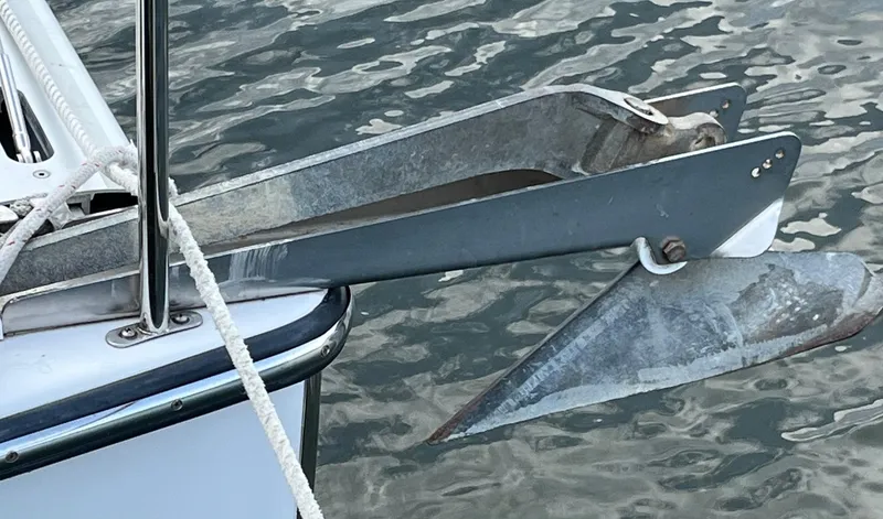 Slide: The Image of Bow of PDQ 32 boat with anchor, 2003 model, on water. - 10