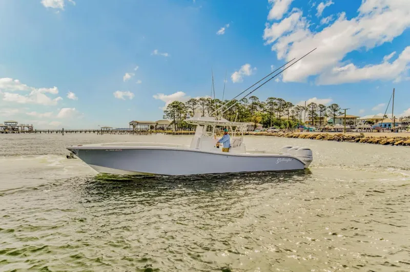 Slide: The Image of 2017 Yellowfin 36 Offshore boat cruising on a sunny day with blue skies. - 22