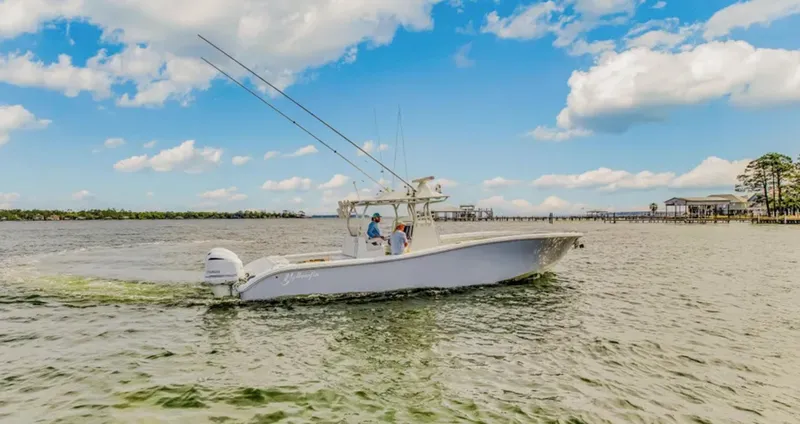 Slide: The Image of 2017 Yellowfin 36 Offshore boat cruising on a sunny day with blue skies. - 8
