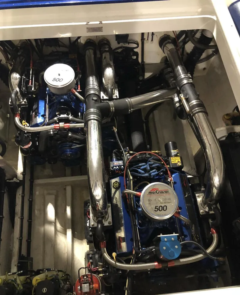 Slide: The Image of Engine compartment of a 1998 Fountain 42 Lightning boat, featuring dual Mercury 500 engines. - 10