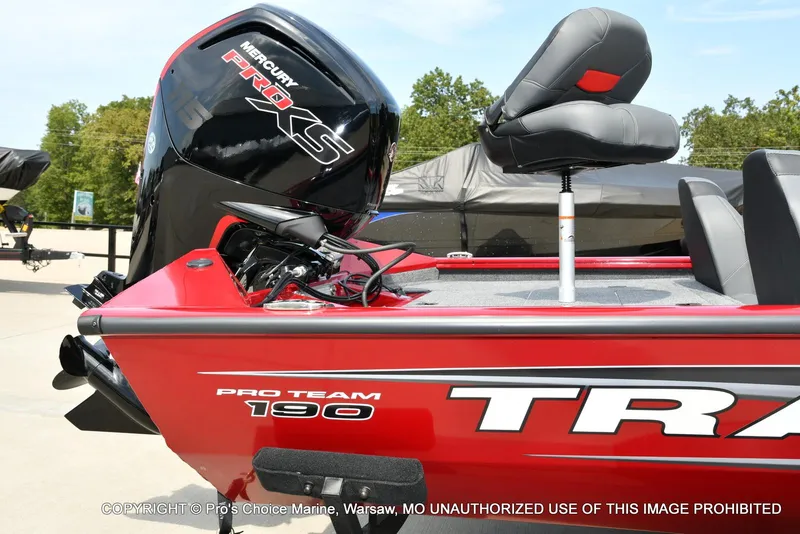 Slide: The Image of 2025 Tracker Pro Team 190 TX boat with Mercury Pro XS engine, red exterior, and seating. - 16