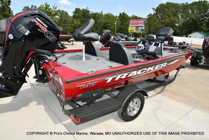 Slide: The Image of 2025 Tracker Pro Team 190 TX boat with Mercury Pro XS engine on trailer. - 17