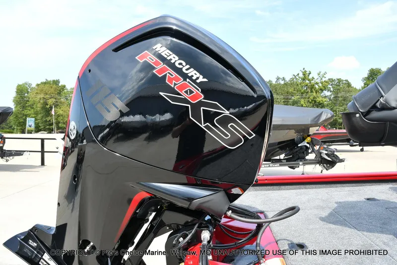 Slide: The Image of Mercury Pro XS engine on 2025 Tracker Pro Team 190 TX boat, outdoor setting. - 20
