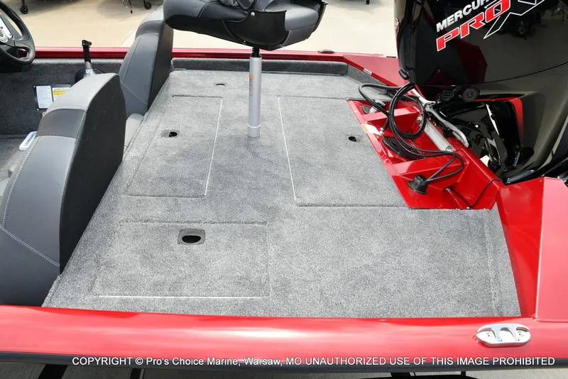 Slide: The Image of 2025 Tracker Pro Team 190 TX boat interior with Mercury Pro engine, featuring spacious seating and storage. - 32