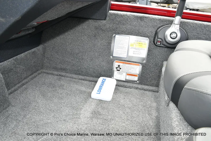 Slide: The Image of Interior of 2025 Tracker Pro Team 190 TX boat with Lowrance equipment and safety labels. - 36