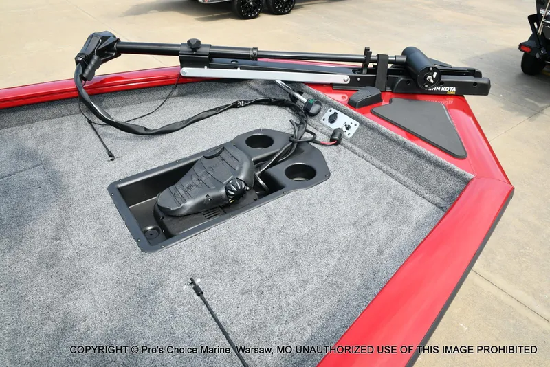 Slide: The Image of 2025 Tracker Pro Team 190 TX boat deck with trolling motor and foot pedal. - 4