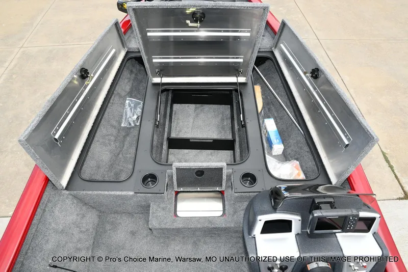 Slide: The Image of 2025 Tracker Pro Team 190 TX boat storage compartments open, showcasing interior layout and equipment. - 46