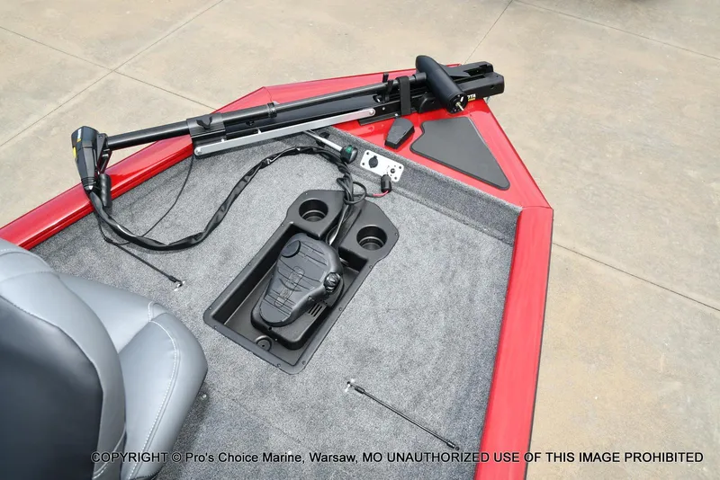 Slide: The Image of 2025 Tracker Pro Team 190 TX boat deck with trolling motor and foot pedal controls. - 9
