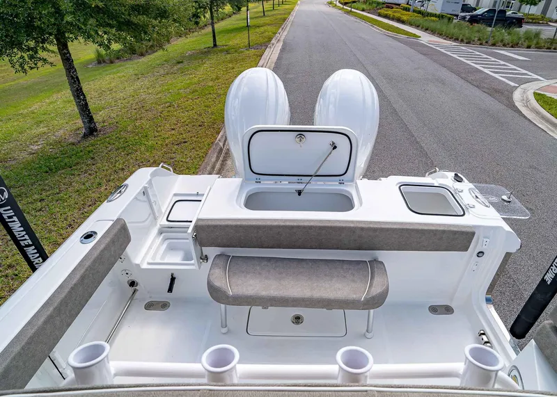 Slide: The Image of 2025 Sea Hunt Gamefish 25 boat interior with seating and storage compartments. - 10