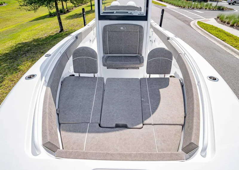 Slide: The Image of 2025 Sea Hunt Gamefish 25 boat interior with cushioned seating and spacious layout. - 25