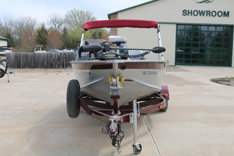 Slide: The Image of 2014 Alumacraft Competitor 165 CS boat on trailer outside showroom. - 3