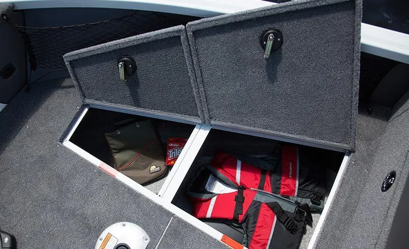 Slide: The Image of 2014 Alumacraft Competitor 165 CS boat storage compartments with life jackets and gear. - 33