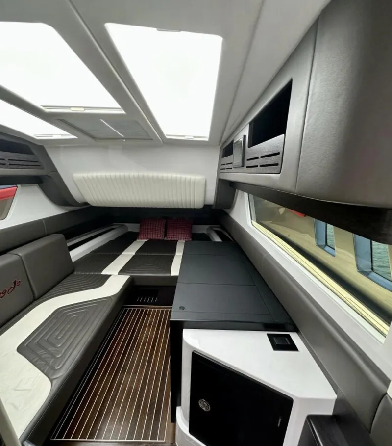 Slide: The Image of Interior of 2020 Cigarette 59 Tirranna boat, featuring sleek modern design and comfortable seating. - 14