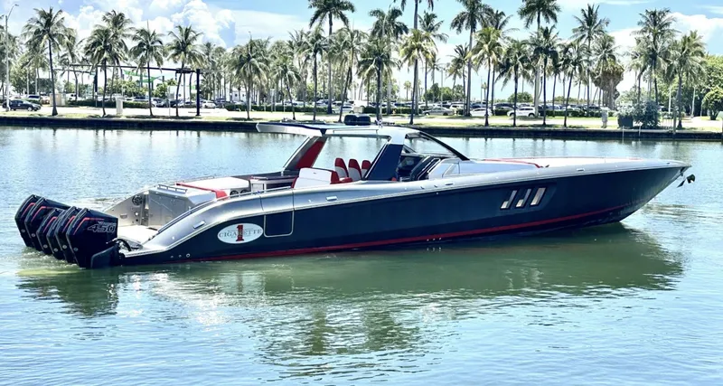 Slide: The Image of 2020 Cigarette 59 Tirranna luxury boat on calm water, surrounded by palm trees. - 5