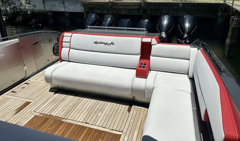 Slide: The Image of 2020 Cigarette 59 Tirranna luxury boat with white and red seating on teak deck. - 7